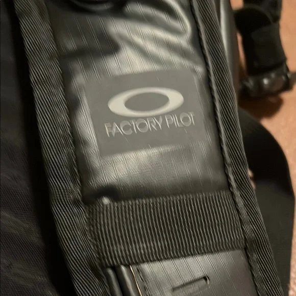 Oakley Waterproof Black Roll-Top Backpack with Tactical Design - Picture 7 of 7